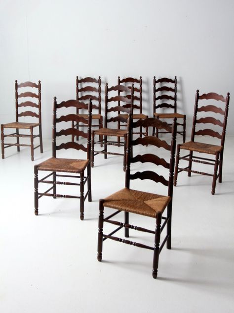 "This is a set of eight Tell City Chair Company chairs circa 1924 - 1943.  The tall ladder back chairs feature hand-woven rush seats.  A beautiful collection of dining chairs.   CONDITION In good condition with wear consistent with age and use. Patina and scuffs from natural usage.  MEASUREMENTS Height:              40\"     ...        101.6 cm Depth:               18\"      ...       45.7 cm Width:               18\"   ...       45.7 cm Seat Height:     18\"   ...       45.7 cm SHIPPING Standar Antique Ladder, Tall Ladder, Ladder Back Dining Chairs, Ladder Chair, Vintage Ladder, Ladder Back Chairs, Rustic Chair, Dining Chairs Set, Wood End Tables