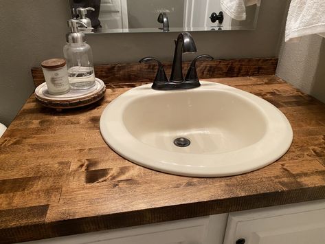 Butcher block bathroom counter made by my husband, per my request. LOVE IT! Wood Sink Countertop Bathroom, Bathroom Wooden Countertop, Butcher Block Countertops In Bathroom, Butcher Block Counter Bathroom, Bathroom With Butcher Block Counter, Butcher Block Bathroom Countertops, Bathroom Butcher Block Counter, Butcher Block In Bathroom, Diy Bathroom Countertop Makeover