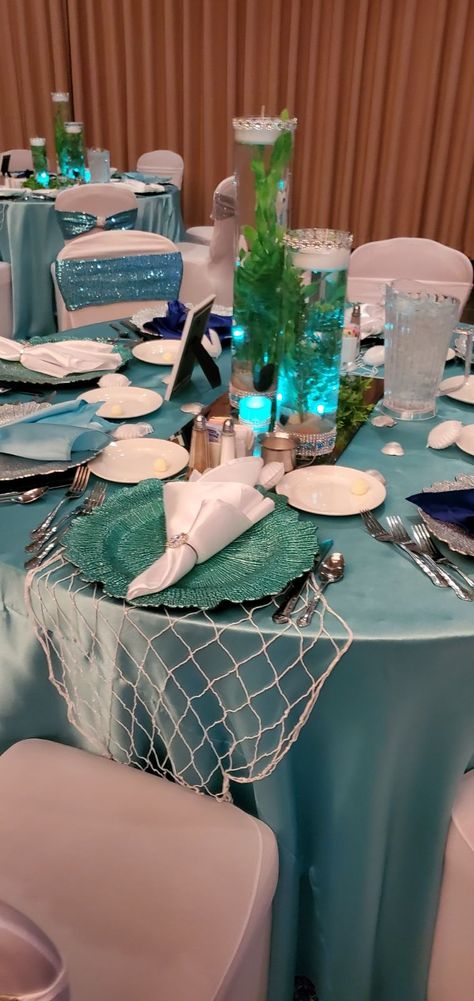 Underwater Table Decorations, Aquarium Theme Wedding, Enchantment Under The Sea Decorations, Under The Sea Theme Wedding, Under The Sea Xv Theme, Pirate Theme Quinceanera, Under The Sea Decorations Prom, Mermaid Theme Wedding Decor, Mermaid Wedding Decorations