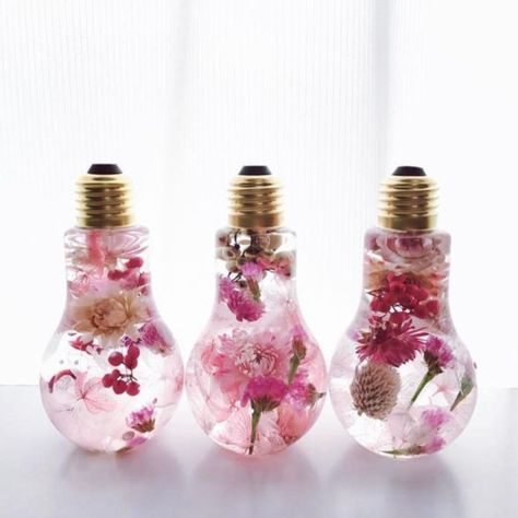 56 Bright Ideas to Recycle Old Light Blubs #DIY Ideas source: https://matchness.com/2018/10/15/56-bright-ideas-to-recycle-old-light-blubs/ Diy Light Bulb Crafts, Recycled Light Bulbs, Diy Light Bulb, Light Bulb Art, Light Bulb Crafts, Flower Bottle, Hanging Vases, Old Lights, Diy Chandelier