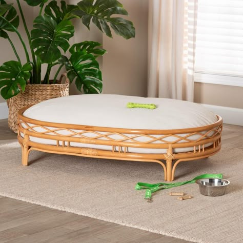 Facilitate your beloved animal companion to enjoy serene relaxation with the lovely Jovia pet bed. Made in Indonesia, this bohemian piece is handcrafted from natural rattan by skilled artisans. The oval silhouette features a unique openwork design rich with geometric charm to cradle your pet with a sense of rustic grace. The Jovia will arrive fully assembled and is fitted with a removable cushion padded with plush foam and upholstered in sumptuous fabric for a superb embrace. Channeling the care Wooden Dog Bed Frame, Raised Wooden Dog Bed, Dog Bed Frame, Wooden Dog Bed, Cat Water Bowl, Medium Dog Bed, Pet Sofa Bed, Dog Water Bowls, Memory Foam Dog Bed