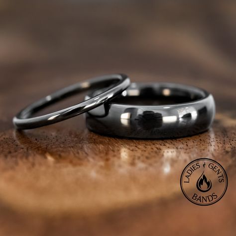 Your wedding ring set order includes + One 6mm Black Polished obsidian tungsten Wedding Band + One 2mm Black Polished obsidian tungsten Wedding Ring + Both Come inside Wax Sealed Ring Boxes. Limited Time: Free Matching Set of Black Silicone Bands w/ Order. *Durable - Incredibly Scratch-Resistant to always look great. *Comfort-fit & Weighty - Designed to fit well and feel good in your hand. *Made to order - Every ring we ship is unique and one-of-a-kind. *6mm - Most popular standard width for men Black Matching Wedding Rings, Black Band Wedding Rings, Matching Black Wedding Bands, Wedding Ring Sets Black, Tungsten Wedding Bands Women, Black Wedding Bands His And Hers, Obsidian Ring Engagement, Black Wedding Ring For Women, Matching Rings For Couples Wedding Bands