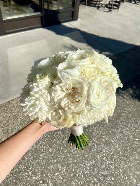 at Mastronardi Estate Winery. Florals by Thiessans The Flower Shop. #wedding #bridalbouquet #roses #ranunculus #bouquet #winery #kingsville #ontario #canada Flour Bouquet, Bouquet With Ranunculus, Flower Shop Wedding, Kingsville Ontario, Ranunculus Wedding Bouquet, Ranunculus Wedding, Ivory Bouquet, Ranunculus Bouquet, Garden Roses