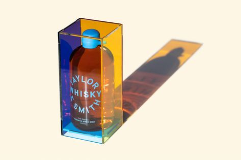 The completely transparent, amber acrylic box used for packaging was a brilliant and bold choice, leaving no room to question if the taste of the whiskey is as crisp as its aesthetic. Whisky Packaging, Acrylic Display Box, Launch Campaign, Contrast Lighting, Taylor Smith, Creative Industry, Single Malt Whisky, Malt Whisky, Adobe Premiere Pro