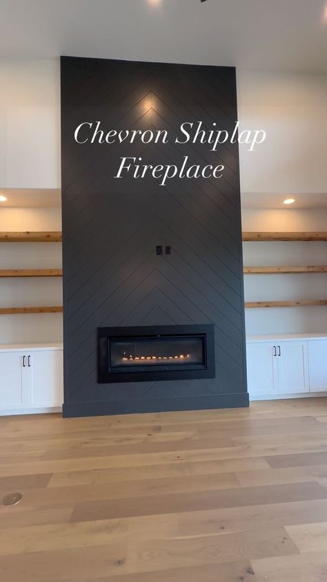 This floor to ceiling chevron pattern shiplap makes this fireplace such a beautiful focal point in this modern farmhouse living room. #princeconstruction #customhome #customhomes #fireplace #shiplapfireplace #chevronpattern #blackfireplace #ironore #gasfireplace #boernehomes #homesofinstagram #homesofinsta #buildersofig #customhomebuilder #texasbuilders #texaahomes #boerne #boernetx #boernetexas #sabinascreekranch | Prince Construction | oldiesforlife__ · Original audio Fireplace Feature Wall Ideas Shiplap, Floor To Ceiling Fireplace Shiplap, Herringbone Backsplash Fireplace, Black Herringbone Shiplap Fireplace, Herringbone Tile Fireplace Wall, Black And Wood Fireplace Wall, White Vertical Shiplap Fireplace, 2025 Fireplace Trends, Black Shiplap Fireplace With Built Ins