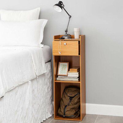 Latitude Run Keep your essentials within arm’s reach while you sleep with this nightstand. Two shelves of open bottom storage are ideal for displaying decorative keepsakes or quick access to books or a laptop. A single sliding drawer keeps smaller accessories out of sight. This extra height compact nightstand is sized perfectly for raised beds and small space bedrooms and is a great solution for your bedroom organization. Colour: Beech College Furniture, Tall Bedside Table, Tall Nightstand, Tall Nightstands, Bed Nightstand, Shelf Nightstand, Small Nightstand, Dorm Storage, Nightstand Decor