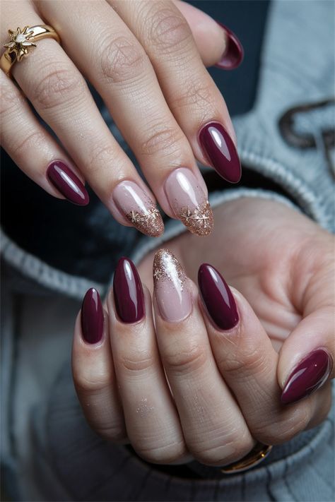 Embrace the beauty of autumn with these stunning fall nail ideas that sparkle with charm! Picture your nails adorned in rich burgundy and golden hues, featuring delicate glitter accents to capture the season's essence. This nail style will surely add a touch of glamour to your fall wardrobe. Perfect for cozy gatherings or a night out, these nails are bound to turn heads!笨ｨ #FallNailIdeas #NailArt #AutumnNails #Sparkle #NailInspo Glitter Nails Burgundy, Winter Round Nails, Burgundy Sparkle Nails, Burgundy Almond Nails Design, Burgundy Gold Nails, Burgundy Nails With Glitter, Wine And Gold Nails, Burgundy Nails With Design, Sparkle Accent Nail