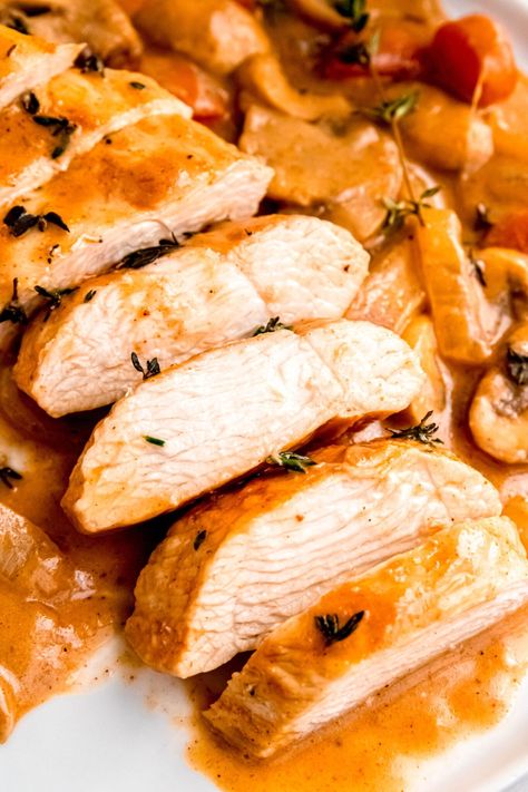 Whip up gourmet in under an hour with this one-pot wonder: Dutch Oven Dijon Chicken Breasts! In just an hour, enjoy a dish that's not only a breeze to make but also to clean up. This recipe blends lean protein-rich chicken, a vibrant mix of veggies, & a lusciously creamy yet light sauce for a meal that's both hearty & healthy. Perfect for busy weeknights or a cozy dinner, it's sure to satisfy & nourish without the heaviness. Get ready for a flavor-packed meal that's as easy as it is delicious! Chicken In The Dutch Oven, Creamy Chicken Dutch Oven Recipes, Chicken Breast Dutch Oven, Whole Chicken Dutch Oven Stove Top, Dutch Oven Chicken Breast Recipes, Chicken In A Dutch Oven Easy Recipes, Chicken Breast Dutch Oven Recipes, Boneless Skinless Chicken Thigh Recipes Dutch Oven, Slow Cooked Chicken Breast