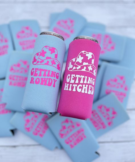 "These Getting Rowdy and Getting Hitched slim bachelorette party can coolers will make the perfect addition to your bachelorette party weekend in Nashville, Austin, or wherever you and your girls choose to celebrate! Let your bride tribe know how happy you are to celebrate your bachelorette weekend with them by gifting them these personalized bachelorette coozies - They also makes the perfect favor that they can take home with them.  These slim or can coolers can be used to help ask your family Bachelorette Nashville, Wedding Phrases, Retro Bachelorette Party, Country Bachelorette, Weekend In Nashville, Retro Bachelorette, Western Bachelorette, Personalized Bachelorette, Bachelorette Party Weekend