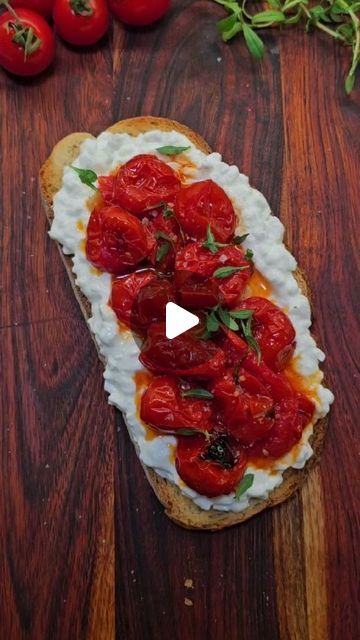 Kateryna Barger on Instagram: "My absolute favorite toast, constantly on repeat 🙈♥️

It is perfect for a lazy weekend brunch or a quick weekday breakfast, just prep the roasted tomatoes ahead of time! Your taste buds will thank you 🙌

Ingredients:

- 4 slices of bread
- 5 cloves of garlic, peeled, sliced
- 2 cups cherry tomatoes
- 1/4 cup of extra virgin olive oil
- 1 tbp each herbs of your choice, I am using savory
- 1/4 tsp red pepper flakes (optional)
- cottage cheese
- sea salt
- more fresh herbs, to garnish

Instructions:

Preheat the oven to 350°F (180°C).
In a baking dish, mix together the garlic, cherry tomatoes, herbs, spices and extra virgin olive oil.
Roast in the oven for 40-45 minutes until the tomatoes and garlic are soft and slightly caramelized.
While the tomatoes are roa Bread With Cottage Cheese, Cooked Tomatoes, Roast In The Oven, Weekday Breakfast, Lazy Weekend, Herbs Spices, Weekend Brunch, Slice Of Bread, Baking Dish