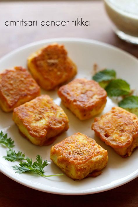 amritsari paneer tikka recipe - paneer cubes marinated in a mix of gram flour, herbs+spices and then shallow fried #paneer #snacks Marinated Paneer, Paneer Starters, Paneer Tikka Recipe, Paneer Snacks, Fried Paneer, Paneer Dishes, Tikka Recipe, Indian Curries, Paneer Tikka