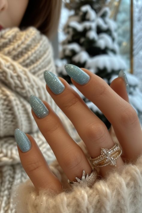 Ice Blue Nails Ice Blue Glitter Nails, Ice Inspired Nails, Cold Blue Nails, Winter Icy Nails, Blue Sparkly Winter Nails, Jack Frost Nails, Light Blue Nails With Sparkle, Frosty Winter Nails, Frosty Nail Designs