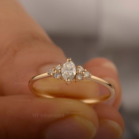 14K Gold Diamond Cluster Ring/ Genuine Round and Marquise Diamond Ring/ Unique Diamond Wedding Ring/ Minimalist Stackable Ring/ Gift For Her * SKU: SGR02730-48730  * Made to Order. * Gold Purity: 14K Solid Gold (stamped) * Custom Gold Color: Yellow, Rose, White Gold * Custom Gold Purity: 10K/14K/18K (Charges Apply) * Diamond 100% Genuine Diamond * Marquise Diamond Weight: 0.19 ct. * Round Diamond Weight: 0.09 ct. * Diamond Color: G-H * Diamond Clarity: SI1- SI2 * Diamond Cut: Marquise Cut / Round Cut  >> Product Measurements:- *  Ring Size: 3 to 10 (All sizes available) ✦ Size can be customized as per your request, please mention the required size in buyer notes (Charges may apply). ✦ Shipping We are located in USA NY, We ship worldwide by USPS, UPS, and FedEx. Since most items are 'made t Wedding Rings Women Gold, Wedding Ring Diamond Shape, Simple Stacked Rings, Gold Wedding Rings Minimalist, Cute Small Engagement Rings, Engagement Rings Gold Dainty, Small Marquise Ring, Tiny Wedding Rings, Dainty Wedding Ring Gold