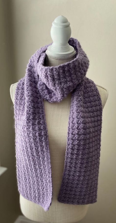 "The \"Wild Orchid,\" is a beautiful shade of soft lavender. Not only is the color soft, but the yarn is extra soft and cozy. You'll be toasty warm while being stunningly fashionable when high wear this scarf. It's long enough to be worn doubled or into a simple loop. It also looks great worn long on warmer days with a sweater or denim jacket. Unlike knitting, crochet cannot be produced by machine. It can only be made by hand which makes this scarf a one-of-a-kind piece of wearable art. The scar Knit Chunky Scarf, Lavender Scarf, Chunky Crochet Scarf, Chunky Scarf, Scarf Yarn, Chunky Scarves, Purple Scarves, Crochet Winter, Cozy Scarf