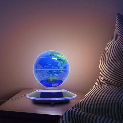 This floating and rotating globe, with a LED light which can be turned on in the dark. The gravity of the floating moon ball can be offset by the suction between the electromagnet and the globe top magnet which makes it possible to float. Magnetic levitation globe is an awesome high tech gadget that people of all ages will enjoy. Suitable for high-tech gifts for anyone, but also as a decor ornament that goes well with any style of home and office furnishings. This magnetic levitation world map g High Tech Gifts, Rotating Globe, Floating Globe, Magnetic Levitation, Blue Table Lamp, Light Decor, Water Globes, Anti Gravity, Led Decor