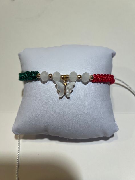 Adjustable bracelet , handmade and able to fit on any wrist however if you are buying for a smaller wrist or a bigger wrist I can always make sure it will fit great for you. Always feel free to leave any comments or reach out !!   Bracelet is with white gold butterfly charm & Mexico colors themed <3 Mexico Bracelets, Mexico Colors, Mexican Jewelry, Diy Bracelets Easy, Pastel Pink Aesthetic, Gold Butterfly, Butterfly Charm, Bracelet Handmade, Adjustable Bracelet