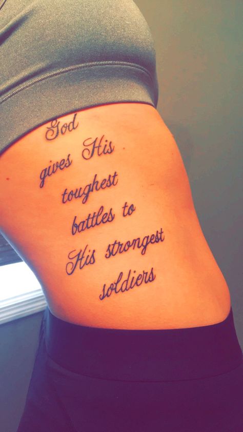 Neat Tattoos For Women, God Gives His Toughest Battles Quotes Tattoo, Back Of Thigh Tattoos Women Writing, Cute Tattoos For Women Ribs, Pretty Rib Tattoos For Women, Thigh Tattoos With Meaning, God Gives His Toughest Battles Tattoo, Female Leg Tattoos Thigh Piece, Crps Tattoo