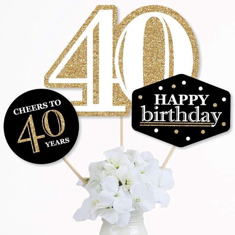 Adult 40th Birthday - Gold centerpiece sticks include 15 40th Birthday for Adults - Gold table toppers in 3 different shapes with 15 wooden sticks and stickers Easy to assemble. Fortieth birthday party table decorations are perfect for birthday parties. Adult 40th Birthday - Gold Party Centerpiece Sticks Size 5 40 Table Topper, 11 W x 8 H, 5 Circle Table Toppers, 5.5 W x 5.5 H: 5 H, Happy Birthday Table Topper 5 pieces, 7 width x 5.25 height inches. The unique design and variety of pieces will make this table decoration kit a great addition to any black and gold theme party. EASY PARTY DECOR: Fortieth birthday table decorations can be used as centerpieces attached to the included dowels and inserted into vases or floral arrangements. Add it to your apothecary jar to easily accent your birt 40th Birthday Centerpiece, 40th Birthday Centerpieces, Gold Theme Party, Gold Centerpiece, Birthday Party Table Decorations, Black And Gold Theme, Birthday Party Table, Birthday Centerpiece, Birthday Table Decorations