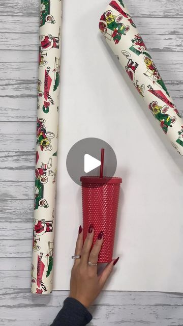 Present Wrapping Fundraiser, Wrapping A Tube Gift, Wrapping Gifts Cilinder, Wrapping A Tshirt, How To Wrap Water Bottles Gift, How To Gift Wrap A Tumbler, How To Wrap A Tumbler, How To Wrap Something Cylindrical, How To Pack Socks As A Gift