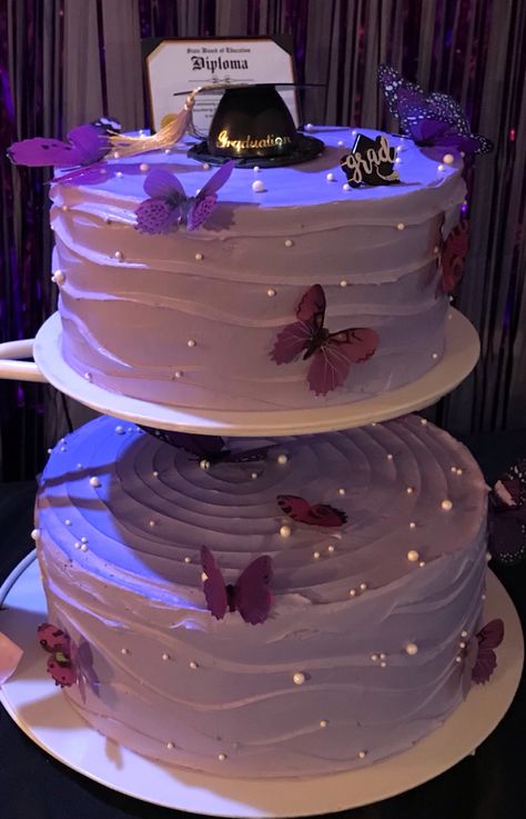 Purple Butterfly graduation cake, two layer cake, minimalist cake, purple cake inspiration, Minimalist Purple Cake, Purple Themed Graduation Party, Pink And Purple Graduation Party, Butterfly Graduation Party Ideas, Graduation Cake Ideas 2023, Aesthetic Graduation Cake, Graduation Party Ideas Purple, Butterfly Graduation Party, Graduation Cake Aesthetic