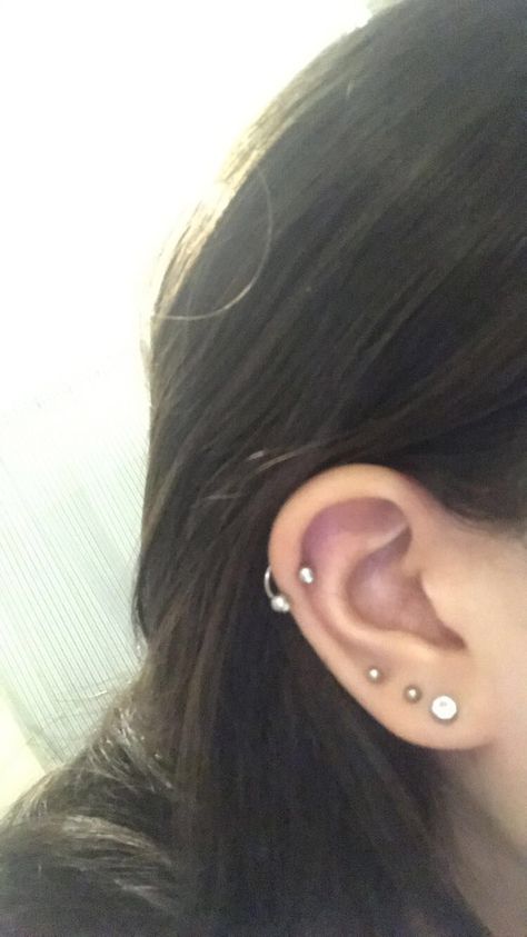 Helix and triple lobe, ear piercings #earpiercings Triple Stud Piercing, Triple Lobe Helix Piercing, Lobe Piercings Triple, Lower Helix Piercing Studs, Triple Lobe Piercing Ideas Silver, Ear Lobe Piercings Triple, Triple Lobe And Helix Piercing, Triple Ear Piercing, Triple Lobe