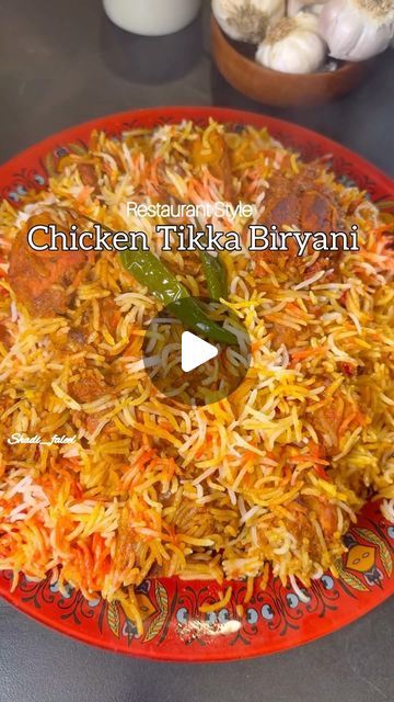 415K views · 28K likes | Fathima Yusuf (Shadiya) on Instagram: "Chicken Tikka Biryani !!

Enjoy the aromatic flavours of Chicken Tikka Biryani, delicious tender chicken tikka pieces, and fragrant basmati rice.

LIKE, SAVE, SHARE the reel &
FOLLOW @shadi_faleel for more easy recipes.

You’ll eed:
1kg Bonesless Chicken 
1/3 cup Oil
1 cup Yoghurt 
Juice of 1 Lemon
1 tbsp Salt
1 tsp Turmeric powder 
1 tbsp Chilli powder 
1 tbsp Kashmiri chilli powder 
1 tbsp Coriander powder 
1 tbsp Cumin powder 
1 tsp Garam masala 
1/4 cupTomato paste
1 tbsp Ginger garlic paste
1/4 tsp Red food colouring 
1/4 cup Chopped mint leaves 

1/2 cup Oil
1 cup Fried onions
1/3 cup Tikka masala 
1 tsp Turmeric powder 
1 tsp Chilli powder 
1 tbsp Kashmiri chilli powder 
1 tbsp Coriander powder 
1 tsp Cumin powder 
1 ts Chicken Tikka Biryani Recipes, Chicken Biryani Recipe Indian, Tikka Biryani Recipe, Chicken Tikka Biryani, Easy Chicken Biryani Recipe, Chicken Tikka Recipe, Kashmiri Chilli, Desi Khana, Indian Rice Recipes