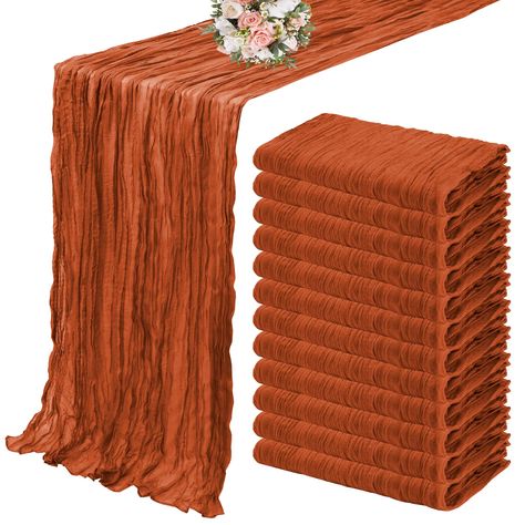 PRICES MAY VARY. Cloth 🎁【Package Include】: You will get 12 pieces 13ft length terracotta cheesecloth table runner,Product size: 35 inches wide and 157 inches long, suitable for round or square tables that can accommodate 10-12 people. Perfect for romantic and elegant party events. 🎁【Premium Material】: The elegant terracotta table runner is made of high-quality polyester, featuring good durability and flexibility,the edge of the table runner is locked with delicate stitching, not easy to fall o Boho Wedding Table Runner, Table Runner For Wedding, Cheesecloth Table Runner, Fall Party Decorations, Fall Wedding Tables, Orange Table, Baby Shower Table, Fall Table Decor, Table Runners Wedding