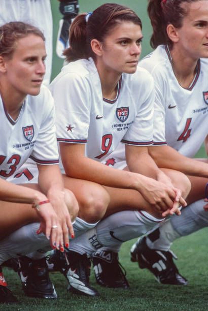 Kristine Lilly #13, Mia Hamm #9, and Carla Overbeck #4 of the Unites States pose for the team photo prior to a FIFA Women's World Cup match against Brazil played on July 4, 1999 at Stanford Stadium in Palo Alto, California. Women’s Football, Soccer Prints, Mia Hamm, Fifa Women's World Cup, World Cup Match, Female Soccer Players, Kit Design, International Football, Women's World Cup