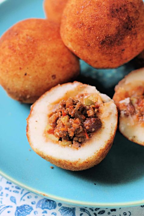 Papas Rellenas! These delicious mashed potato balls are stuffed with seasoned ground beef, then breaded and fried for a most satisfying savory mouthful! A classic Cuban appetizer. Stuffed Mashed Potato Balls, Cuban Appetizers, Fried Potato Balls, Arepas Recipe, Mashed Potato Balls, Spanish Potatoes, Picadillo Recipe, Vegan Egg Substitute, Seasoned Ground Beef