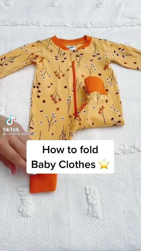 Baby Clothes Organized | Life Hack [Video] | Baby clothes storage, Folding baby clothes, Baby clothes organization Folding A Onesie, How To Fold Footed Pajamas, Folding Baby Pajamas, How To Organize Baby Stuff, Folding Newborn Clothes, Folding Baby Onesies, How To Fold Newborn Clothes, How To Fold Baby Onesies, How To Fold Onesies