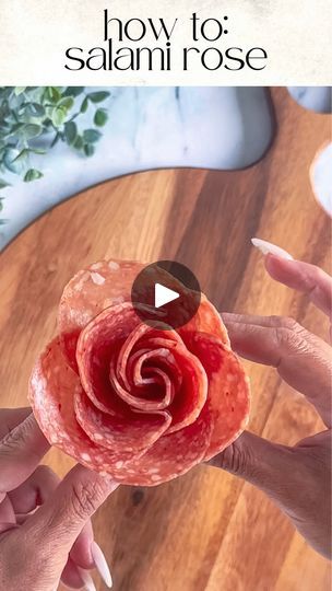 33K views · 1.7K reactions | DIY: SALAMI ROSES 🌹 

Tools: 2oz condiment cup and 11 salami slices

Layer: Place 5 slices halfway over the first one around the cup. 

Create the bud: Fold 6 slices of salami in half with the rounded side up. Layer the folded slices on top of the other right to left. 

Roll: Start rolling from one end to the other, securing the base as you go.

Finish: Gently spread the “petals” to create a rose shape.

PRO TIP: Mix and match different types of salami for added texture and flavor. 🌟

SAVE and FOLLOW @charcuterie_n_things for more cheese and charcuterie food styling tips!

#charcuterie #foodstyling #cheese #grazingtable #partyplanning #fooddesign #longisland #fyp #charcuterieandthings #easyappetizers #quickandeasy #CheeseBoard #Charcuterie #SnackTime #foodie Cheese Roses, Salami Rose, Charcuterie Food, Salami And Cheese, Decorative Food, Fruit Trays, Aioli Sauce, Charcuterie Recipes, Veggie Tray