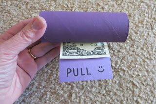 Fun way to give money as a gift. Line up dollar bills end to end. Tape each bill together then roll up.  Insert in an empty (painted) toilet paper roll with a notch cut out. Directions and additional photos on blog. Super cute idea from Cindy deRosier. Dollar Bill Gift, Painted Toilet, Money As A Gift, Box Regalo, Creative Money Gifts, Birthday Money, Ge Bort, Christmas Money, Dollar Bills