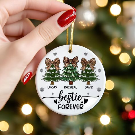 🎄 Delight your family and friends with these stunning, personalized ornaments for any occasion! Crafted from premium ceramic, they make the perfect keepsake or decorative gift. Each ornament comes gift-ready in its own box and includes a ribbon for easy hanging. ☃️ Product Details: Material: Premium Ceramic Size: 3 Inches Handmade with love by the TramieGifts team 💝 FAQ Q: What is the processing time? A: Orders are processed within 2-5 business days. Q: How long does shipping take? A: Within t Bestie Forever, Sisters Ornament, Bows Pattern, Friend Ornament, Bow Pattern, Personalized Ornaments, Gift Decorations, Wedding Basket, Christmas Ornament