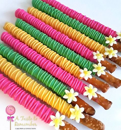 Cake Pops & Confections 💙 on Instagram: “Chocolate dipped pretzel rods for a Shopkins themed party 💗💛💚 . . #shopkinsparty #shopkinspretzels #shopkinstheme #shopkins…” Palm Tree Pretzel Rods, Hawaiian Pretzel Rods, Tropical Party Treats, Hawaiian Party Dessert Table, Luau Party Dessert Table, Luau Birthday Cookies, Luau Party Treats, Moana Pretzel Sticks, Hawaiian Treats Luau Party