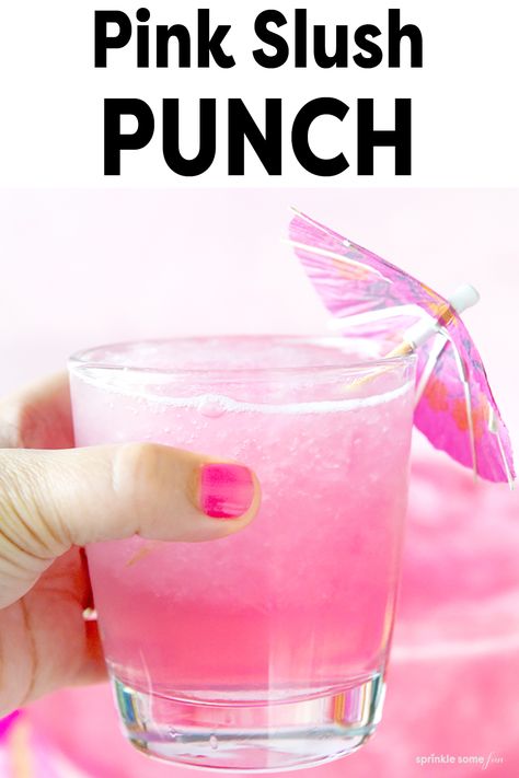 Pink punch in a glass cup with a bright pink drink umbrella. Slush Punch Recipes Non Alcoholic, Pink Slushy Punch, Pink Sorbet Punch, Easy Pink Punch Recipes Non Alcoholic, Pink Punch Nonalcoholic, Mermaid Punch For Kids, Pink Punch For Baby Shower Recipe Easy, Slush Punch, Pink Party Punches