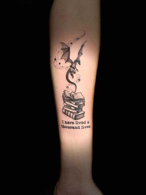 Tattoo Ideas For Bookworms, Book Dragon Tattoo For Women, Dragon Book Tattoo For Women, Booklover Tattoo Ideas, Dragon And Book Tattoo Ideas, Book And Dragon Tattoo Ideas, Book Girl Tattoo Ideas, Book Magic Tattoo, Dragon Books Tattoo