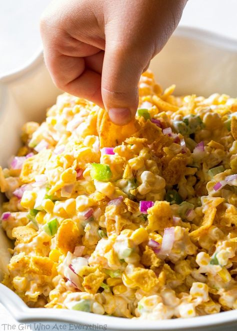 Frito Corn Salad - this is your game day recipe. Corn, Fritos, peppers, and onion. So good! Frito Recipe, Creative Salads, Frito Corn Salad, Chili Cheese Fritos, Corn Salad Recipe, Potluck Side Dishes, Corn Salad Recipes, Potluck Dishes, Dressing Recipes