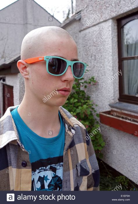 a teenage boy with a skinhead haircut Stock Photo Bald Boy Aesthetic, Skinhead Haircut, Kid Aesthetic, Bald Men Style, Bald Look, Going Bald, Mens Haircuts, Male Pattern Baldness, Pattern Baldness