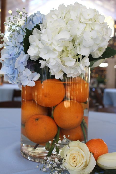 Centerpieces With Oranges Fruit, Lil Cutie Centerpieces, Cutie On The Way Centerpiece, Cuties Centerpiece, Cutie Orange Centerpiece, Orange You Curious Gender Reveal Ideas, Blue And Orange Bridal Shower Ideas, Little Cutie Baby Shower Table Centerpieces, Cutie Orange Baby Shower Theme Centerpieces