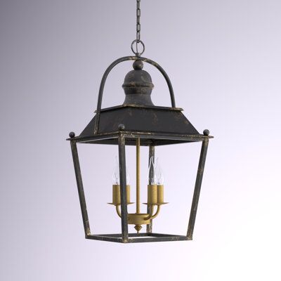 This 4-light chandelier features a geometric silhouette with gothic-inspired elements to bring a traditional feel to your living room or foyer. An open metal cage shows off a distinctive lantern-style design and an antique black iron finish. A rusty gold-accented candelabra fixture hangs within and holds in place four exposed dimmable bulbs, sold separately. We recommend getting candle flame bulbs to round out the look with a flourish. This chandelier hangs with the help of a 6' length of chain Dining Room Candle, Lantern Light Fixture, Geometric Lantern, Lite Brite, Dining Room Cozy, Chandelier Metal, Lantern Chandelier, Rectangle Chandelier, Geometric Chandelier