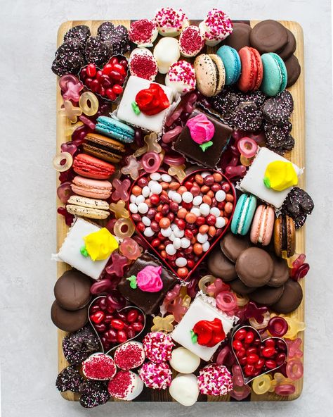 Petits fours, macarons, jelly beans and more comprise a Valentine's Day dessert board(Rebecca White/Special Contributor) Charcuterie Board Ideen, Brunch Board, Halloween Charcuterie Board, Halloween Charcuterie, Candy Board, Charcuterie Board Ideas, Dessert Board, Halloween Fest, Dessert Platter