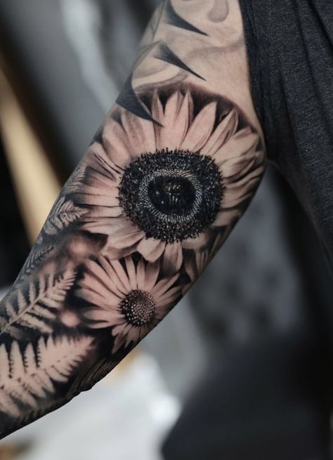 Black and gray sunflower and daisy tattoo Daisy Flower Tattoos Men, Masculine Daisy Tattoo, Sunflower And Daisy Tattoo, Black And Grey Sunflower Tattoo, Daisy Sleeve Tattoo, Ferns Tattoo, Black And Gray Sunflower Tattoo, Flower Tats, Sunflower And Daisy