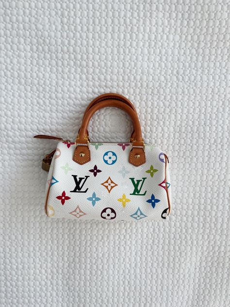 Monogram multicolor vintage mini speedy Mukarami X Louis Vuitton hand bag in white.
Y2K style, hand bag, summer fashion. Louis Vuitton Takashi Murakami Bags, Vintage Louis Vuitton Bag, Murakami Louis Vuitton, Takashi Murakami Louis Vuitton, Louis Vuitton Mini Bag, Vintage Louis Vuitton Handbags, Louis Vuitton Murakami, Purse Aesthetic, Elliana Walmsley