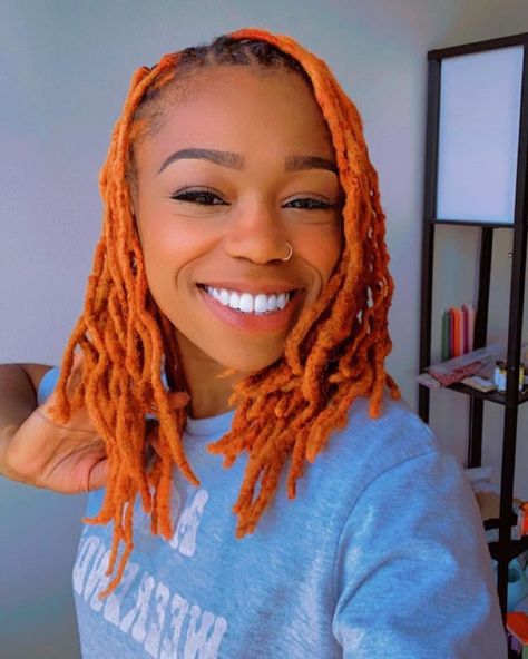 woman with orange locs smiling at camera Ginger Color Locs, Orange Locs Black Women, Loc Color Ideas, Two Tone Locs, Orange Locs, Brown Locs, Color Locs, Dreads Black Women, Ginger Locs