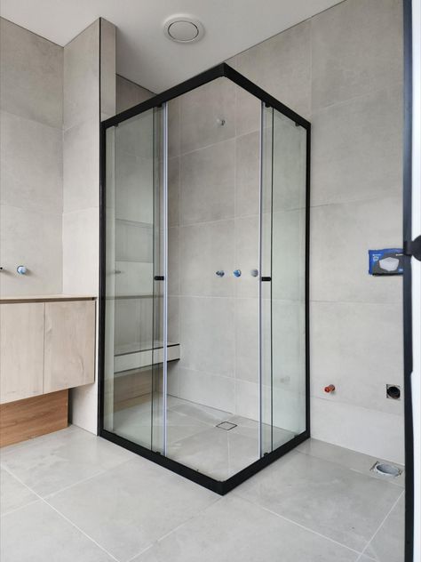 Dual frameless sliding doors enable Corner Entry options for smaller shower enclosures in confined areas, providing clear and easy access. Small Sliding Shower Door, Sliding Door Shower Enclosure, Corner Entry Shower Enclosure, Sliding Shower Screen, Shower Enclosure Ideas, Adu Bathroom, Sliding Door Shower, Corner Shower Doors, Sliding Shower Screens