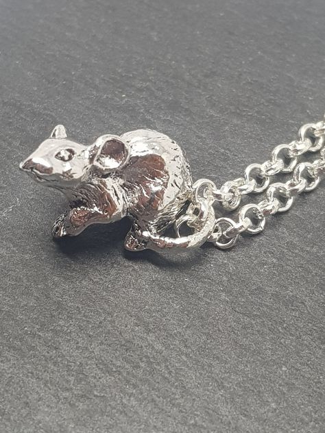 Antique Silver Rat Necklace with Silver Necklace. The Rat Measures 20mm x 12mm and is Silver Plated and Solid. The Necklace Measures 18 inches and also Silver Plated. I do have this Necklace available in Gold. https://etsy.me/3hIK6pD If you require a Black Cord Necklace instead of the Chain just pop me a message Gift Bag I have a Small Animal Rescue where I currently have Rats, Gerbils and Guinea Pigs (photos) and any other Furbaby needing a home. They all have a forever home with me. I self-fund Veterinary Bills from my Etsy shop sales. Rat Necklace, Rat Jewellery, Mouse Necklace, Black Cord Necklace, Bone Necklace, Silver Jewelry Design, Cabochon Ring, Cool Necklaces, Forever Home