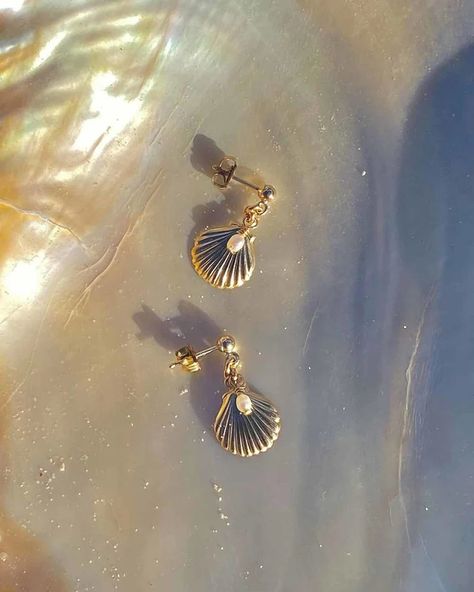 Feel the ocean's magic ✨🐚 These dainty light-weight, seashell dainty earrings are perfect for wintery cold plunges or a sunset dinner by the shore. Sustainably and ethically handcrafted in Ocean-safe, tarnish free and hypoallergic 14k Gold Filled. . . . . . #beachvibes #beachjewellery #shellearrings #oceanlovers #oceansoul #goldearrings #mermaidstuds #mermaidjewellery #goldfilledjewellery #daintyjewelry Seashell Pearl Earrings, Sunset Dinner, Gold Pearl Earrings, Ocean Lover, Shell Earrings, Dainty Earrings, Dainty Jewelry, Beach Jewelry, Pearl Drop Earrings