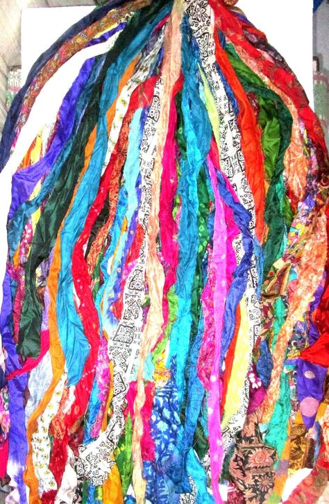 PRICES MAY VARY. Pure Silk Sari Fabric Skeins / Yarn / Ribbons / Handmade Total 42 Strips, each strip 1 yard (36 inches) long, and around 1 to 2 inches wide, tied at the top. Pull out the ones you want to use and retie! Made from Pure Silk Sarees! Made from Vintage/ Recycled silk, so they can have irregular weaves. Edges are frayed which adds to the beauty! Can be use for small projects, decorating, gift wrapping, scrapbooks, journals, jewelry etc Each bundle is completely unique. If you want ex Sari Ribbon, Recycled Sari Silk, Silk Fabrics, Ribbon Yarn, Vintage Sari, Journal Scrapbook, Sewing Ribbon, Sari Fabric, Traditional Fabric