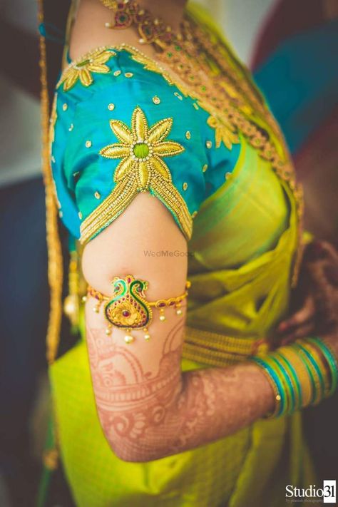 South Indian bridal blouse with green saree and armlet Blouse Designs Indian Bridal, Sarees South Indian, Indian Blouse Designs, Blouse Designs Catalogue, Sari Design, Wedding Saree Blouse, Wedding Saree Blouse Designs, Cutwork Blouse Designs, Sarees Wedding