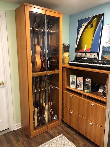 Armoire1 | Oldschool59 | Flickr Storage For Musical Instruments, Studio Guitar Room, Storing Guitars At Home, Closet Recording Booth, Instrument Case Storage, Ikea Guitar Display, Instrument Storage Ideas Music Rooms, How To Store Guitars, Guitar Practice Room